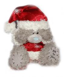 Медвежонок в костюме Деда Мороза